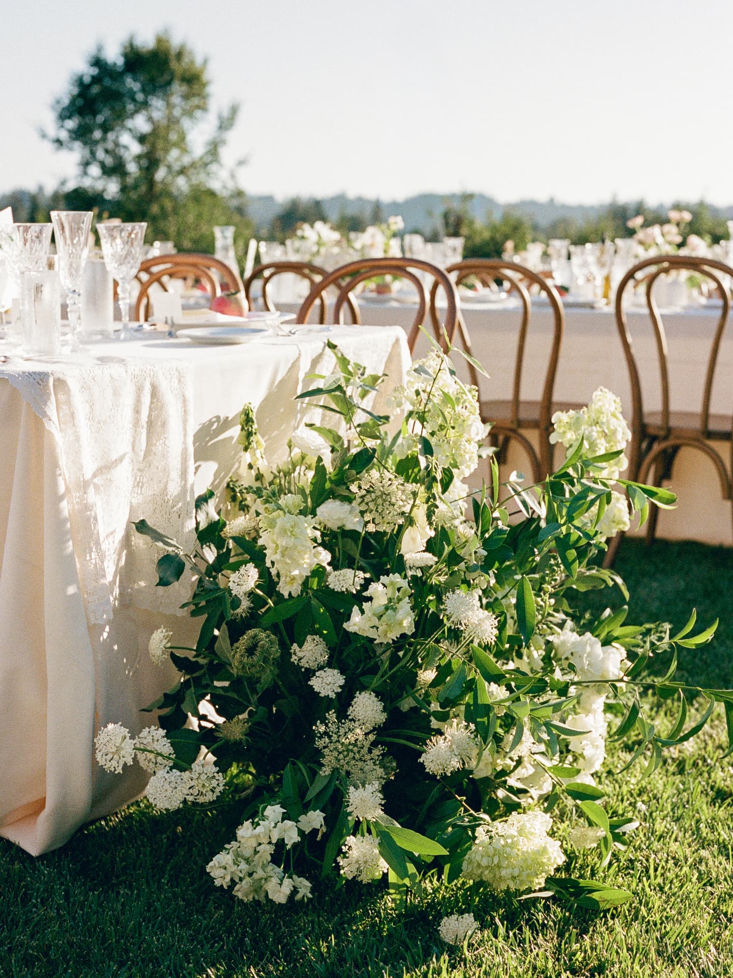 Garden urns and greenery at a coastal Mendocino wedding